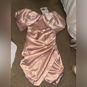 Leau satin corset mini dress. Color is blush pink/rose gold. Size xs